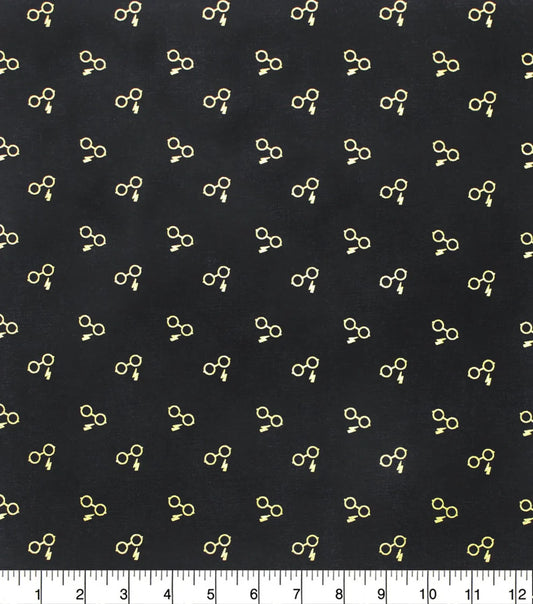 $5/yard  $45/Bolt Licensed Harry Potter Glasses & Bolt Gold Metallic on Black 23800189LJAS